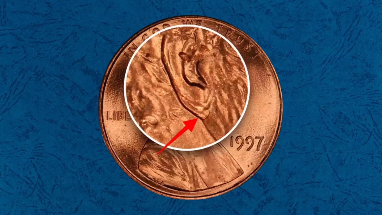1997 FS-101 Doubled Ear penny close-up showing the doubled earlobe and doubled hair curl above Lincoln's ear