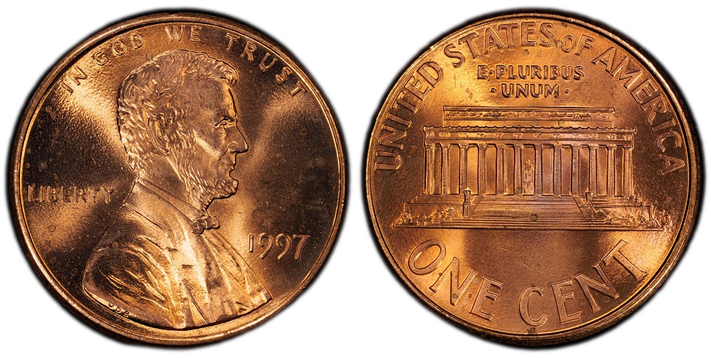 1997 Lincoln penny grading strip showing four condition tiers from worn Good-grade to Gem Uncirculated MS65 Red side by side